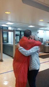 Rusty and his mom hugging as he leaves jail, a free man after having served four years of what would have been 3 life sentence.